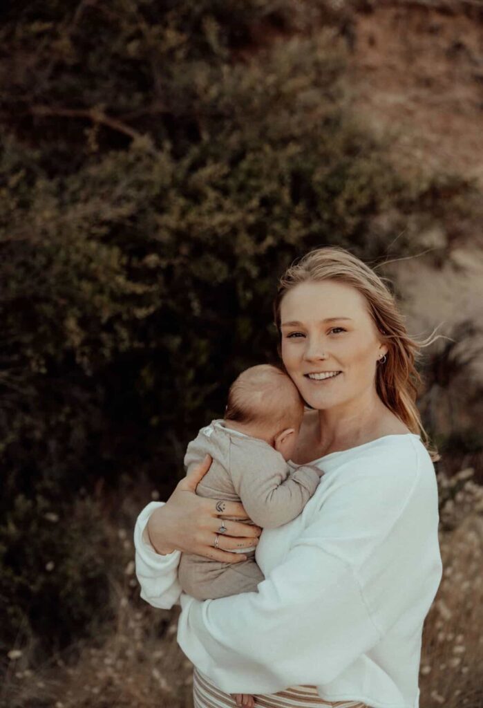 mother holding baby